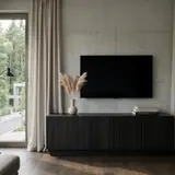 RIFF TV-Schrank von Radis in schwarz gebeizter Eiche als kompaktes 145 cm TV-Lowboard mit gerillter Front