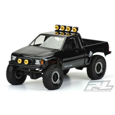 PRO-LINE 3466-00 1985 TOYOTA HILUX SR5 KARO KLAR (CAB & BED) SCX10 TRAIL HONCHO 12.3 (313MM) RADSTAND |  | Artikelnummer: PRO3466-00