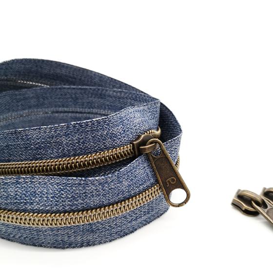 Reißverschluss endlos metallisiert breit altmessing - denim blau