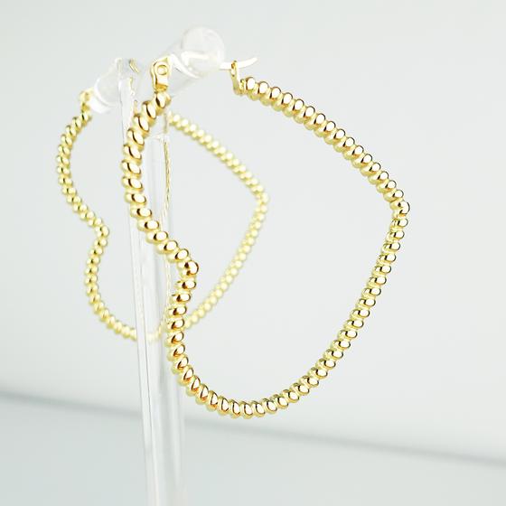 goldmarie Ohrringe Creolen HERZ gedreht - Stahl vergoldet - 5cm