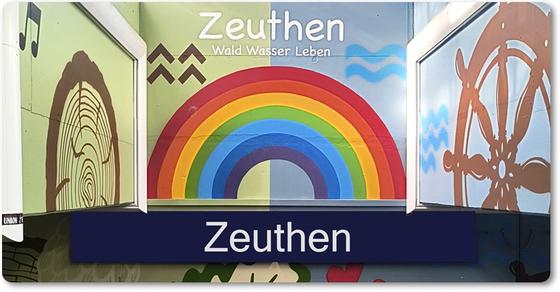 S-Bahnhof Zeuthen Kühlschrankmagnet weiße Schrift auf blauem Steifen unter Regenbogen