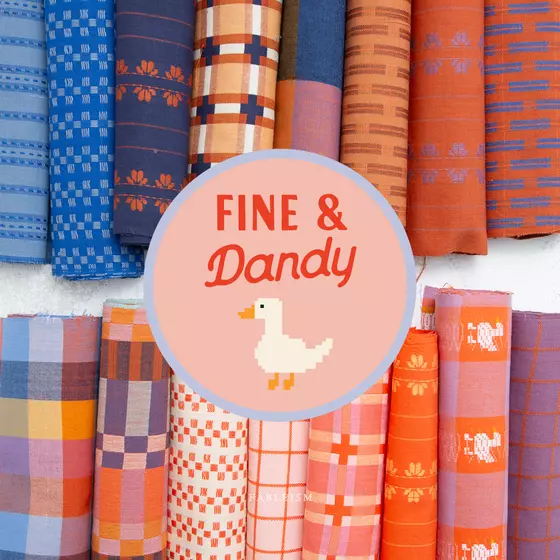 Fine & Dandy Fat Quarter Bundle von Fableism mit 16 gewebten Baumwollstoffen in harmonischen Farben und Mustern.