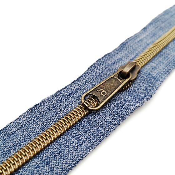 Reißverschluss endlos metallisiert breit altmessing - denim blau