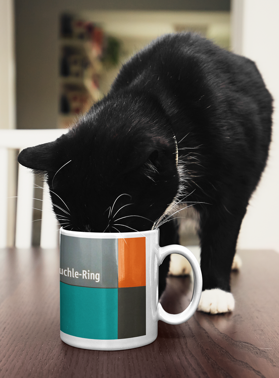 U-Bahnhof Georg-Brauchle-Ring Kaffeetasse - weiße Schrift, auf multicolor Plattenhintergrund