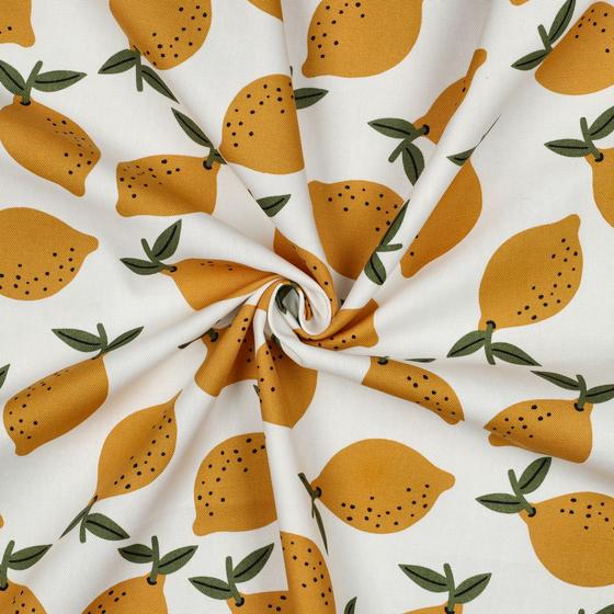 Robuster Canvas-Stoff mit gelben Zitronen auf hellem Hintergrund für sommerliche Taschen und kreative Nähprojekte.