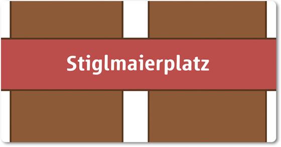 U-Bahnhof Stiglmaierplatz Kühlschrankmagnet - weiße Schrift auf rotem Streifen, vor weiß-braunem gestreiftem Hintergrund