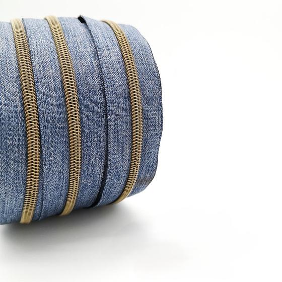 Reißverschluss endlos metallisiert breit altmessing - denim blau