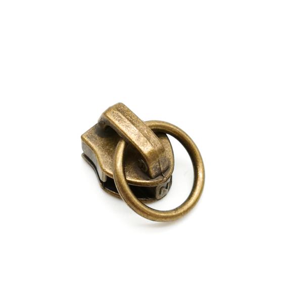 Bügelschieber "Ring" für endlos Reißverschluss breit - altmessing