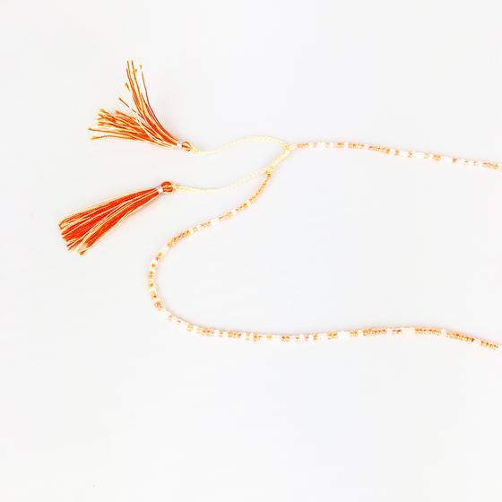 goldmarie Perlenkette FAITH 925er Silber Anhänger mit Fransen-Quast - neonorange-weiß