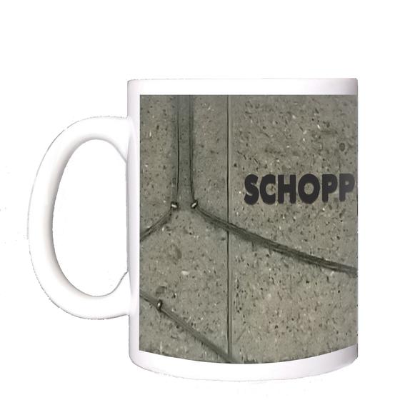 U-Bahn-Tasse Nuernberg Schoppershof der Linie U2 in der originalgetreuen Stations-Gestaltung - die Rückwände in Spritzbeton mit kreuz und quer darüber laufenden Seilen und dazwischen schwarze Buchstaben