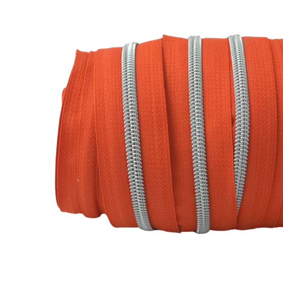 Endlos-Reißverschluss metallisiert silber - pumpkin orange