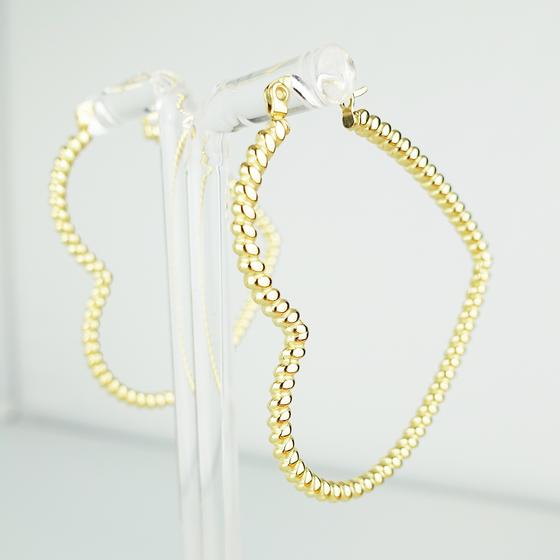 goldmarie Ohrringe Creolen HERZ gedreht - Stahl vergoldet - 5cm