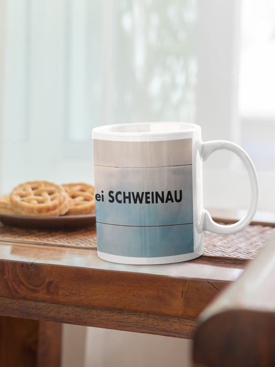 U-Bahn Grossreuth bei Schweinau Kaffetasse schwarze Schrift auf grauem Hintergrund