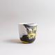 Handgefertigte Porzellan-Tasse von MK Studio mit Wellenstruktur, außen matt, innen glasiert, mit Farbverläufen aus eingefärbtem Porzellan.